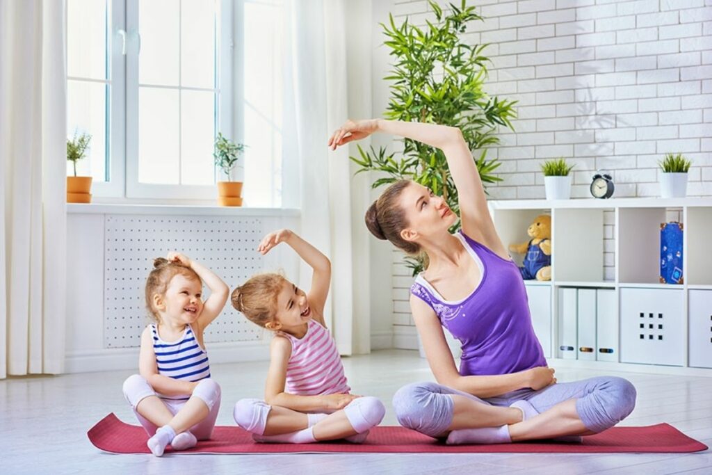 kids and teacher doing yoga at a Preschool & Daycare Serving North Hollywood, Santa Monica & Van Nuys, CA