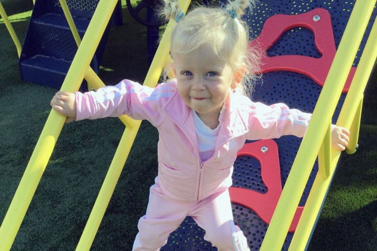 Happy toddler playing outside at a Preschool & Daycare Serving North Hollywood, Santa Monica & Van Nuys, CA