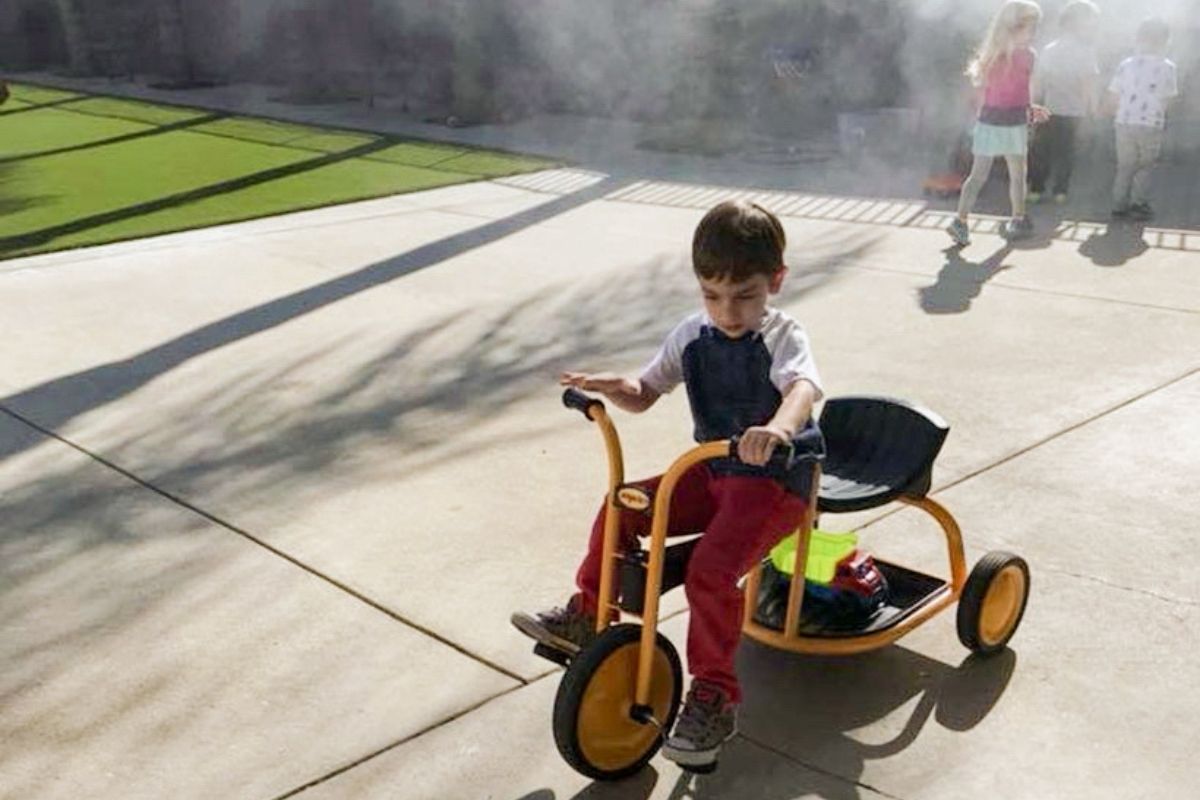 Preschool boy riding a bike